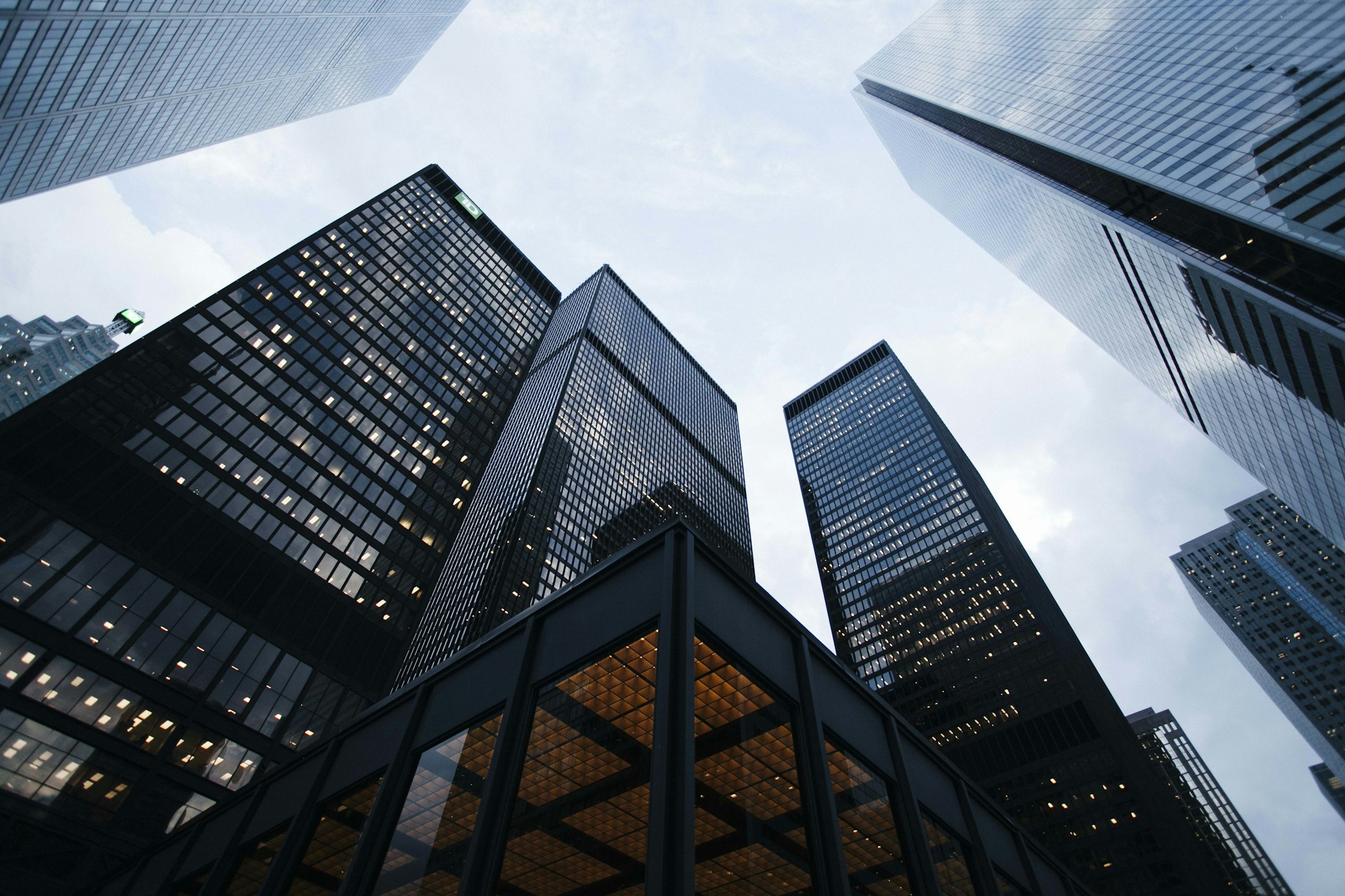 Modern financial district towers viewed from below